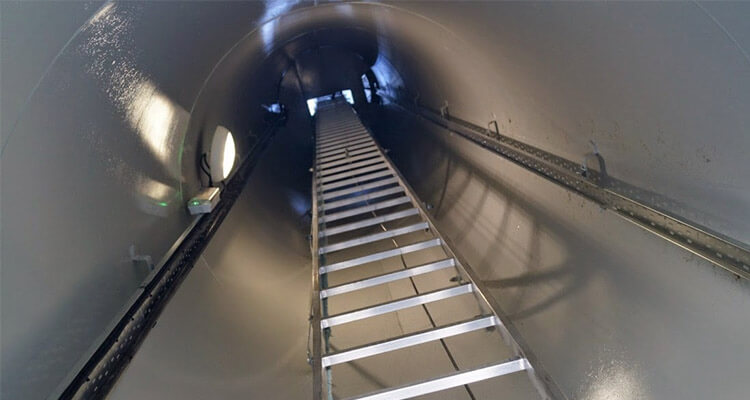 a picture of wind turbine tower and tower internals