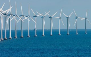 a picture of offshore wind turbine towers