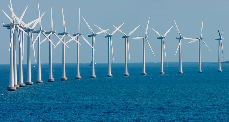 a picture of offshore wind turbine towers